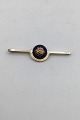 Georg Jensen / 
Royal 
Copenhagen Gilt 
Sterling Silver 
/ Porcelain 
Tiepin (Crown) 
Measures  6 cm 
...
