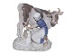 Large Bing & 
Grondahl 
figurine, 
farmgirl with 
calf and white 
cat.
The factory 
mark tells, ...