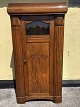 Older cabinet 
in oak veneer 
with faceted 
glass pane. 
From the 
beginning of 
the 1900s, Some 
small ...