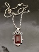 830 silver art 
deco pendant 
3.5 x 2.2 cm. 
with carnelian 
and chain 41 
cm. subject no. 
541659