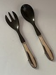 Kugle /Beaded 
Georg Jensen 
sour and sweet. 
Spoon and fork, 
Silver
Length 16 cm.
The stamp, ...