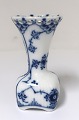 Royal 
Copenhagen. 
Blue fluted, 
full lace. 
Vase. Model 
1161. (1 
quality). 
Height 8 cm.