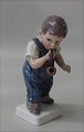 Dahl Jensen 
Marked DJ 
Copenhagen 1027 
Boy with pipe 
15.5 cm (DJ) 
Copenhagen in 
mint condition