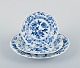 Meissen, Germany, three Blue Onion pattern plates in different sizes.