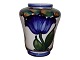 Aluminia vase 
with blue 
flower.
&#8232;This 
product is only 
at our storage. 
It can be 
bought ...