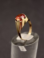 8 carat gold ring  with red topaz