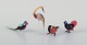 Murano, Italy. 
A collection of 
four miniature 
glass bird 
figurines in 
colored art ...