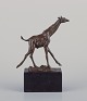 Milo (1955), 
Spanish 
sculptor. 
Bronze 
sculpture of a 
giraffe.
Signed Milo 
and stamped by 
a ...