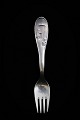 Old children's 
fork in silver 
with the 
Sandman (H.C. 
Andersen). 
(Stamped) L: 
14,5cm. 
(without ...