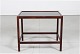Kurt Østervig 
(1912-1986)
Small side 
table made of 
rosewood
with table top 
of black ...
