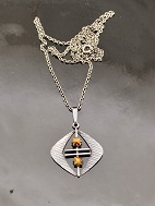 Pendant with amber