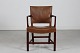 Kaare Klint 
(1888-1954)
"The red 
chair" armchair 
made of 
mahogany 
with patinated 
brown ...