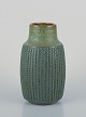 Mari Simmulson (1911-2000) for Upsala Ekeby, Sweden. Ceramic vase with a 
geometric pattern in a greenish glaze.
