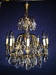 Barok 
Chandelier for 
electricity
Stutter in 
brass with 8 
candel arms
Heigth 80 cm 
diameter ...