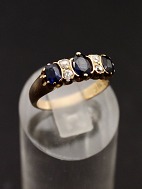 14 carat gold ring  with diamonds and sapphires