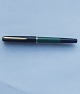 Green Pelikan 
fountain pen 
with black cap. 
Piston filler 
filling system. 
Works fine and 
...