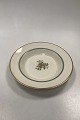 Royal 
Copenhagen 
Fensmark Deep 
Plate No 9587. 
Measures 25 cm 
(9 27/32 in). 
Slight wear on 
gold edge.