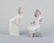 Two Lladro porcelain figurines of young women. Handcrafted.