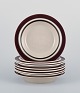 Raija 
Uosikkinen 
(1923–2004) and 
Ulla Procopé 
(1921–1968) for 
Arabia, 
Finland. 
A set of eight 
...