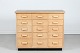 Danish Modern
Merchant desk 
with 15 drawers 
made of oak, 
solid and 
veneer. With 
black desk ...