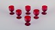 Monica Bratt 
for Reijmyre, 
Sweden. A set 
of six small 
wine glasses in 
mouth-blown 
wine red art 
...