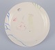 Stig Lindberg 
for 
Gustavsberg. 
"Löja" plate. 
Hand-painted 
with a fish 
motif. 
Satirical ...