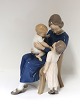 Bing & 
Grondahl. 
Porcelain 
figure. Trio, 
mother with two 
children. Model 
2262. Height 20 
cm. (1 ...