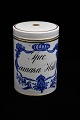 Old Royal 
Copenhagen 
stoneware 
apothecary jar 
with gold rim 
and 
decorations. 
H:16cm. 
Dia.:11cm.