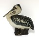 Royal 
Copenhagen. 
Stoneware. 
Pelican. Model 
22296. Design 
Jeanne Grut. 
Height 13.5 cm. 
(1 quality)