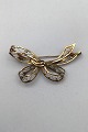 Danish 14 K 
Gold Brooch 
Measures 5.5 cm 
x 2.9 cm (2.16 
inch x 1.14 
inch) Weight 
4.9 gr / 0.17 
oz