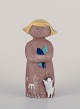 Mari Simmulson 
(1911-2000) for 
Upsala Ekeby. 
Ceramic 
figurine of a 
girl with two 
cats.
Model ...