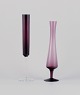 Swedish 
designer, two 
vases in art 
glass crafted 
in a slim 
design.
Violet and 
clear 
mouth-blown ...
