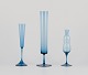 Swedish designer, three vases in art glass crafted in a slim design.
Blue mouth-blown glass.