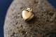Beautiful 
little gold 
heart in 14 
carat gold, 
which is ideal 
as either a 
combination 
with charms ...