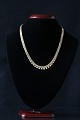 This classic 
gold necklace 
will suit 
anyone who 
appreciates 
good classic 
style. The 
necklace is ...