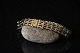 Beautiful gold 
bracelet in V 
pattern, 
designed by 
D.G.K with box 
lock. The 
bracelet is 
unique in ...