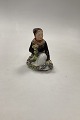 Royal 
Copenhagen 
Overglaze 
figurine of 
Amager Flower 
Girl No 12412.
Measures 
12,5cm / ...