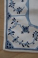 An old table cloth with embroidery, handmadeWith blue fluted pattern115cm x 32,5cmIn a ...