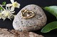 This beautiful 
pendant is 
shaped like a 
double heart, 
made in 14 
carat red and 
white gold. The 
...