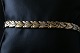 Beautiful 
discreet gold 
bracelet in 14 
carat gold, 
with beautiful 
details on each 
link. Discreet 
...