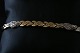 This gold 
bracelet is 
beautiful and 
elegant. 14 
carat 585 gold. 
It is forged 
with detailed 
...
