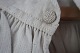 Shift / dress made of good flax
An antique shift with the beautiful emboidery hand madeof flax with monogram, 
gusset in the seam under the arms etc. 
Please look at the old buttons with embroidery
In a good condition
The antique, Danish linen and fust