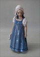Dahl Jensen 
figurine 1219 
Girl "Hanne" 
(Blue w. 
flowers) (DJ) 
21 cm Marked DJ 
Coipenhagen  
and ...
