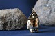Beautiful and 
raw pendant in 
14 carat gold, 
shaped like an 
eskimo from the 
Thule series. 
The ...