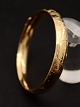 14 carat gold 
bangle 6.2 x 
5.6 cm. 
internal W. 1 
cm. 15 grams 
subject no. 
545283
