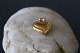 Beautifully 
executed gold 
heart, with a 
simple pattern 
in 14 carat 
gold. This 
small pendant 
is ...