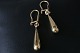 Beautiful earrings cast drop-shaped, and with a large earring in 14 carat gold. These earrings ...