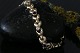 Beautiful and 
elegant gold 
bracelet, with 
inlaid stones 
14 carat. The 
individual 
links are made 
...