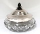 Danish work. 
Crystal bowl 
with hammered 
silver lid 
(830). Diameter 
16.5 cm. Height 
14 cm. ...