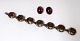 Einar Bernhard 
Fehrn, 
Copenhagen. (E 
F ). Silver 
bracelet with 
amber. Length 
17.5 cm. A set 
of ...